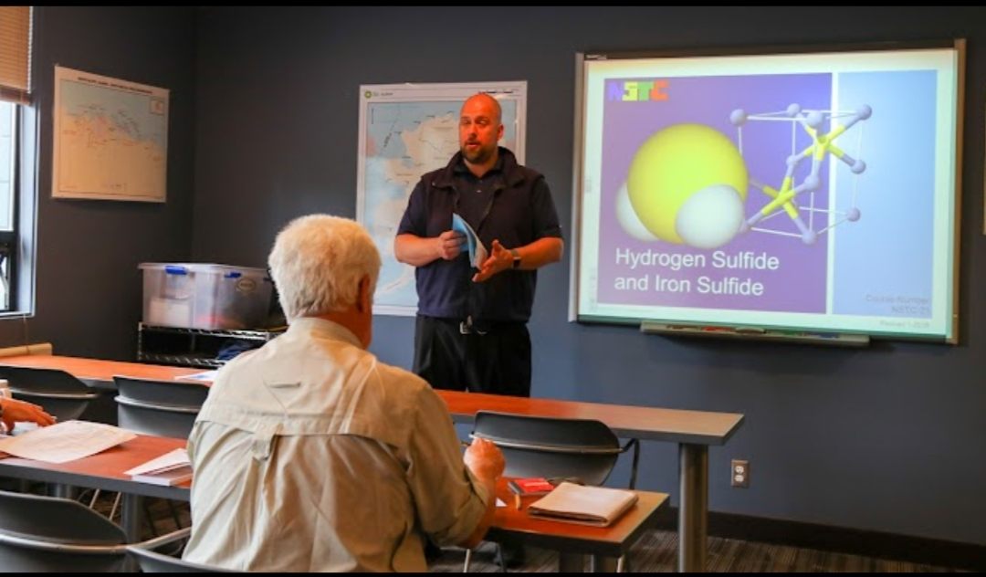 Instructor teaching a corporate safety training class in a classroom